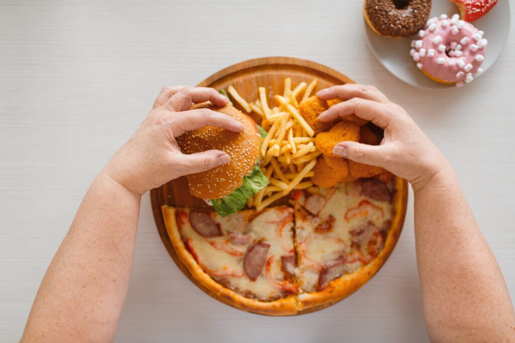 simple carbohydrate foods: pizza, burger, french fries, donuts