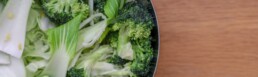 bowl with brassicas: broccoli and pak choi