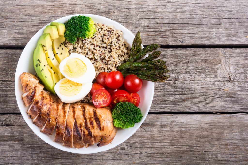 salad bowl with complete proteins quinoa eggs chicken