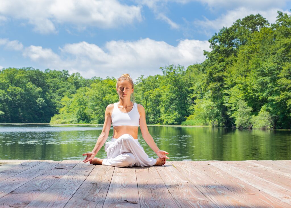 person in yoga pose outdoors